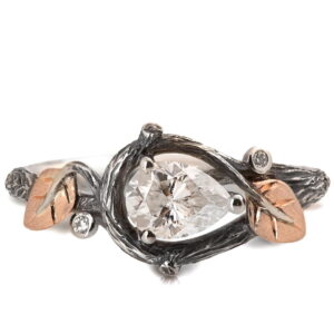 Platinum and Rose Gold Twig and Leaves Pear Moissanite Engagement Ring Catalogue